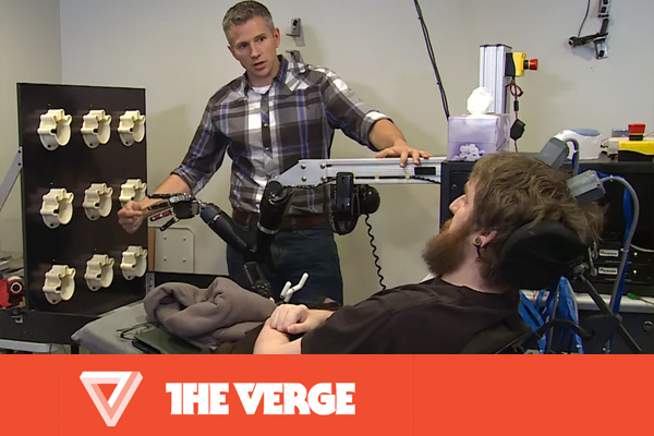 Brain chips let a paralyzed man feel touch through a robotic arm