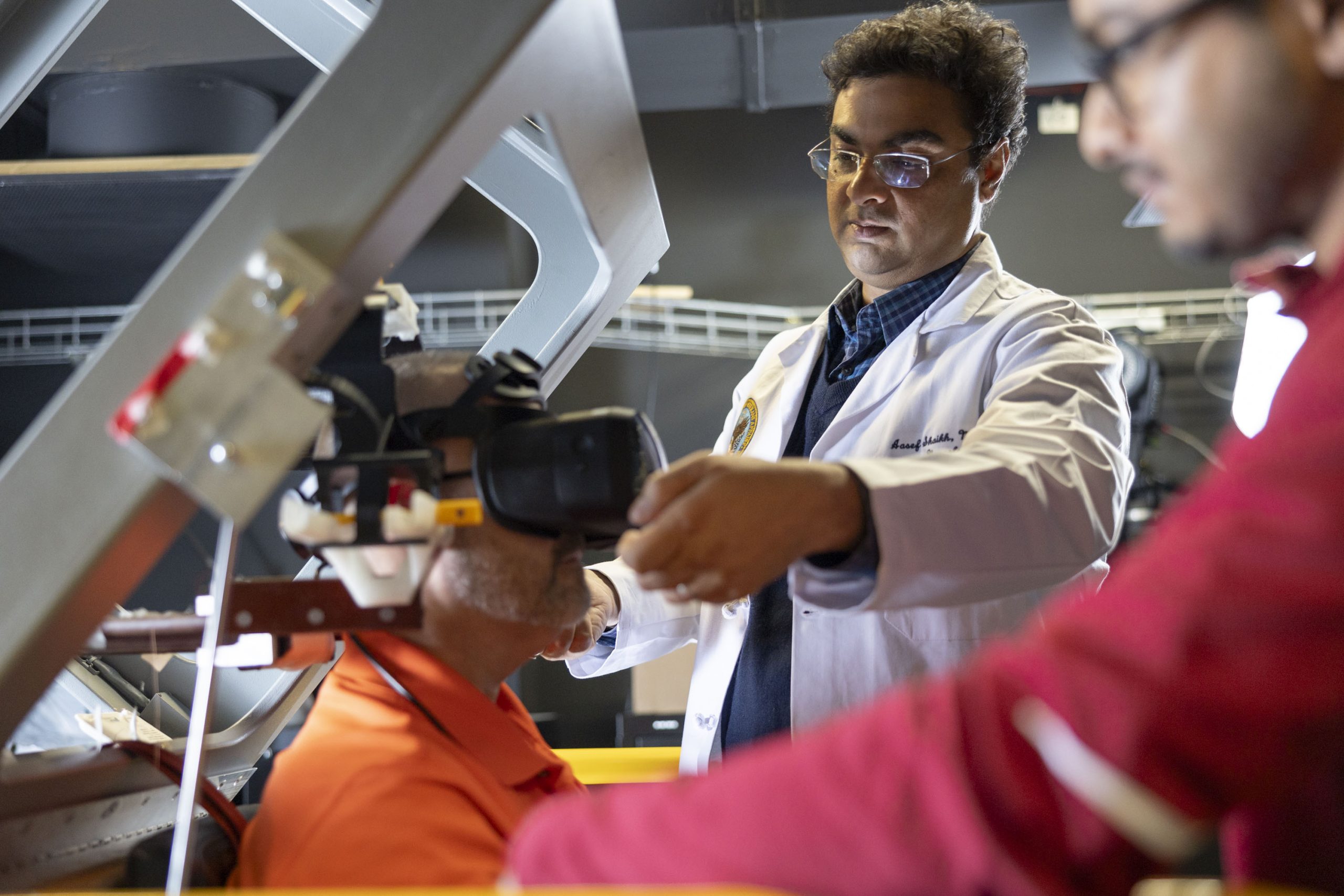 Researchers in a lab discussion