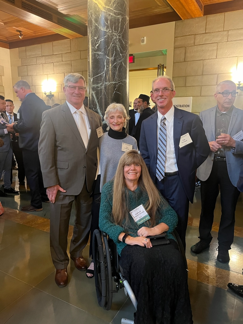 Kim Anderson with colleagues at the induction event